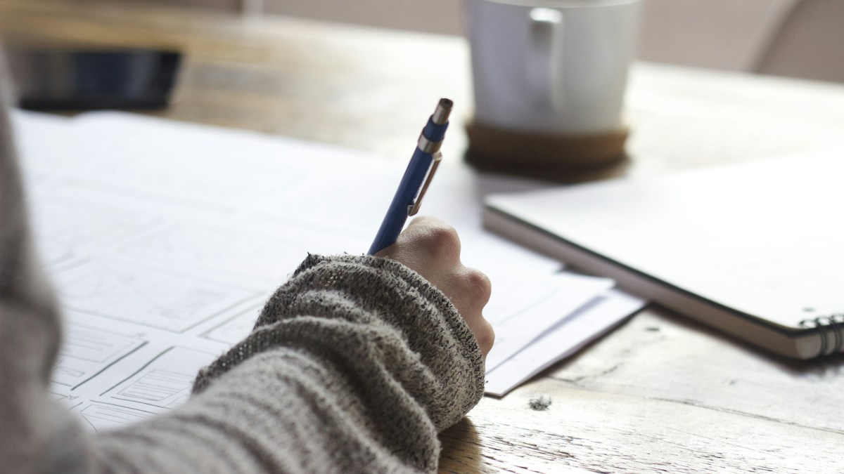 University student studying calculus and computer science at home with the Talent Developments Socratic AI Online Tutor on a laptop