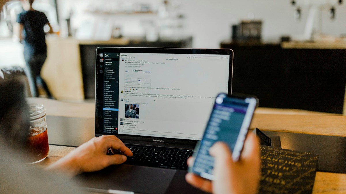 Cybersecurity operations center team analyzing firewall advancement telemetry alongside employee phishing simulation and zero-trust training metrics